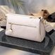 Сумка женская с металлическим украшением посередине из натуральной кожи Vintage 22608 Белая